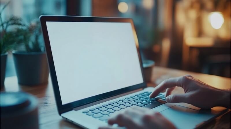 man working on laptop