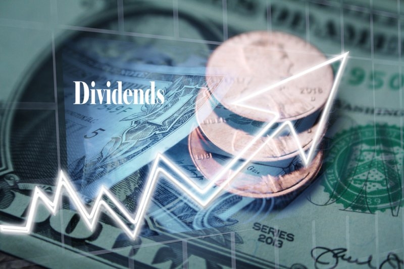An image displaying multiple financial elements with a greater focus on stock dividends