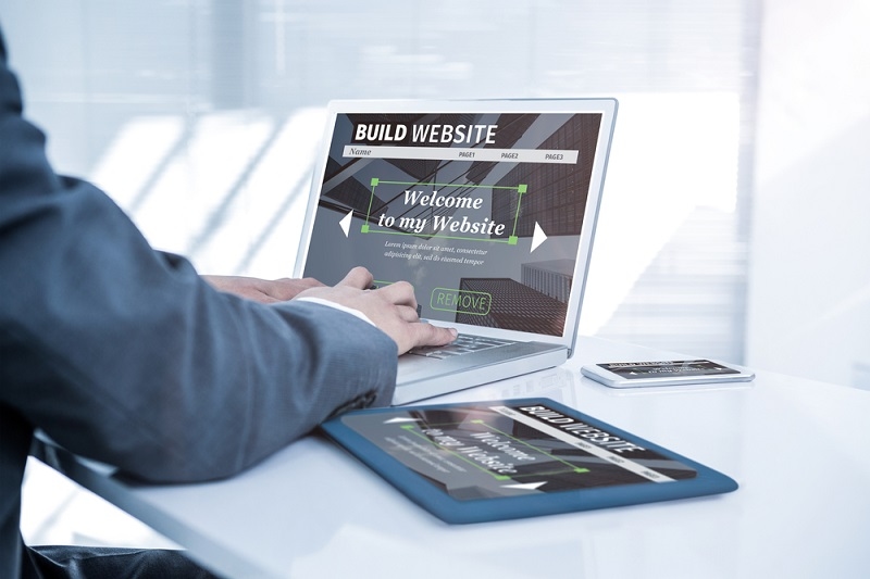 build website interface against businessman using his computer