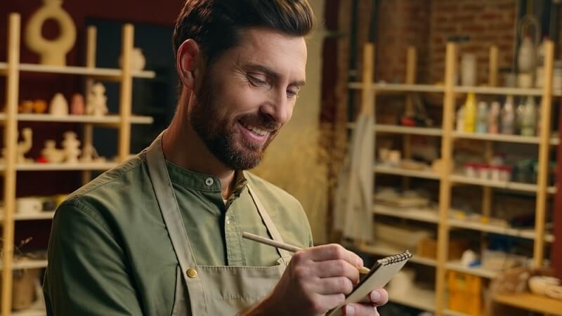 man working in his production based startup