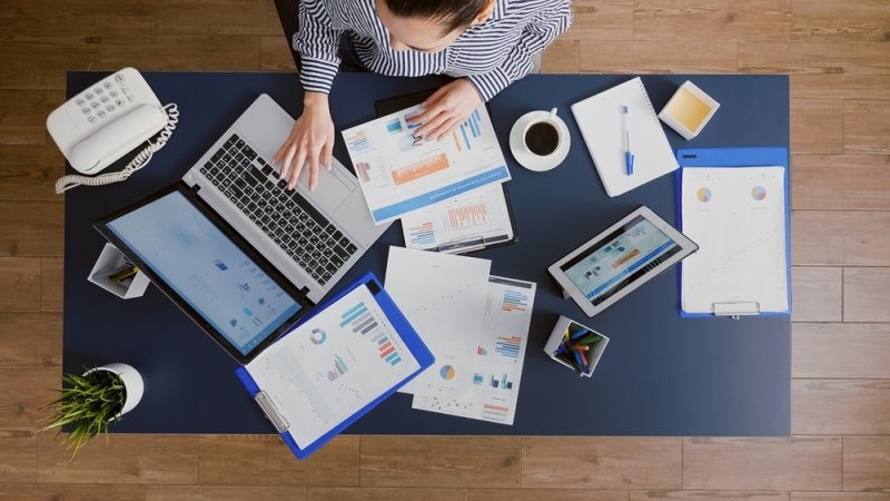 businesswoman analyzing management statistics