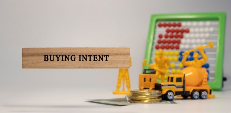 Buying intent written on wooden surface