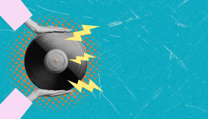 Two hands carefully hold a vinyl record surrounded by graphics