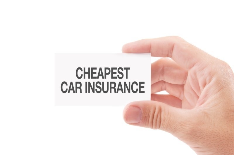 Cheapest car insurance written on a piece of paper.