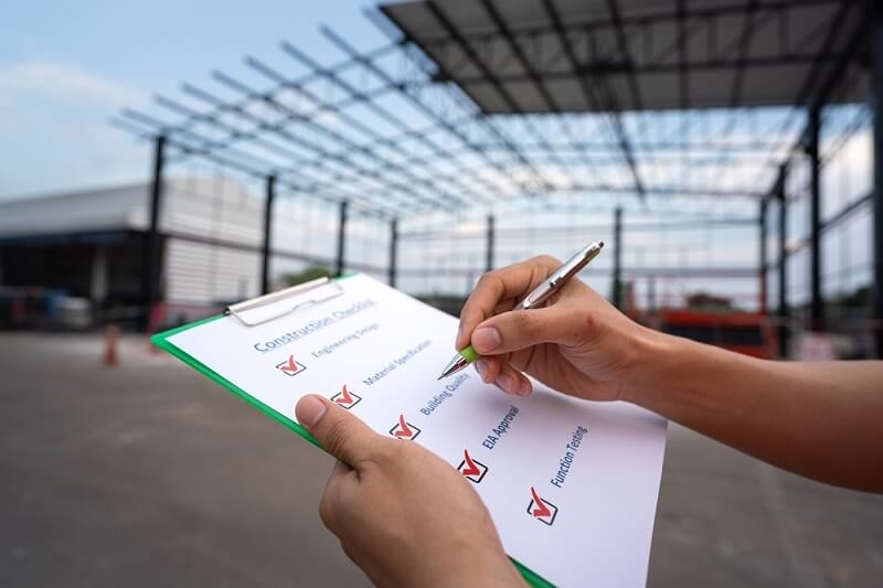 site engineer checking and working according to checklist