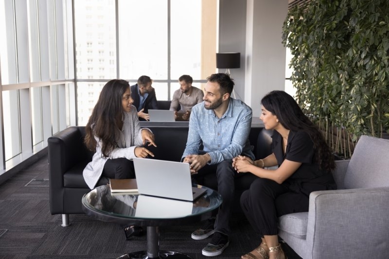 Client consultation in modern workspace.