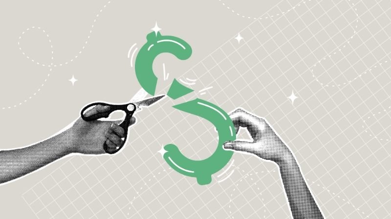 An illustration showing scissors cutting a green circular symbol, suggesting reducing costs, expenses, or insurance premiums.