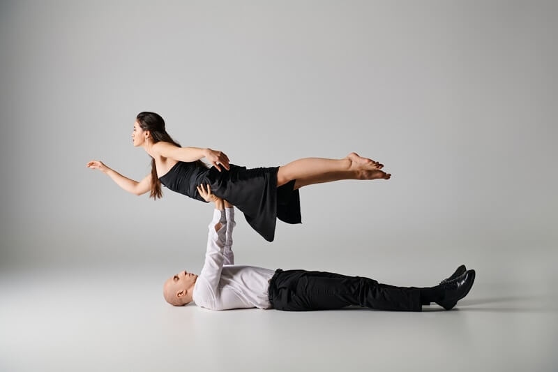 man maintaining balance in couple dance