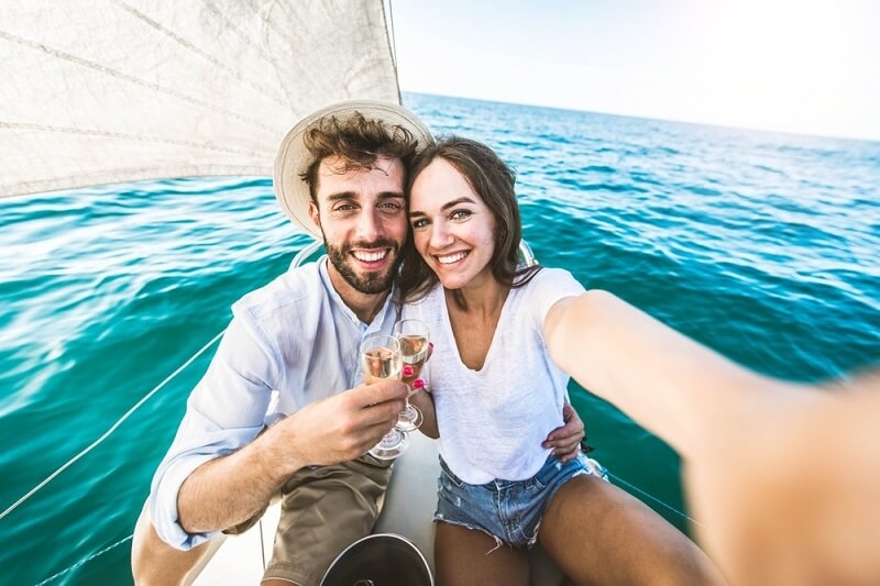couple on sail boat in bali