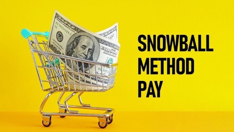 Shopping cart filled with cash beside the words 