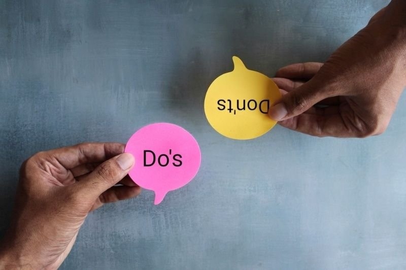 Two hands hold speech-bubble shapes labeled “Do’s” and “Don’ts.”