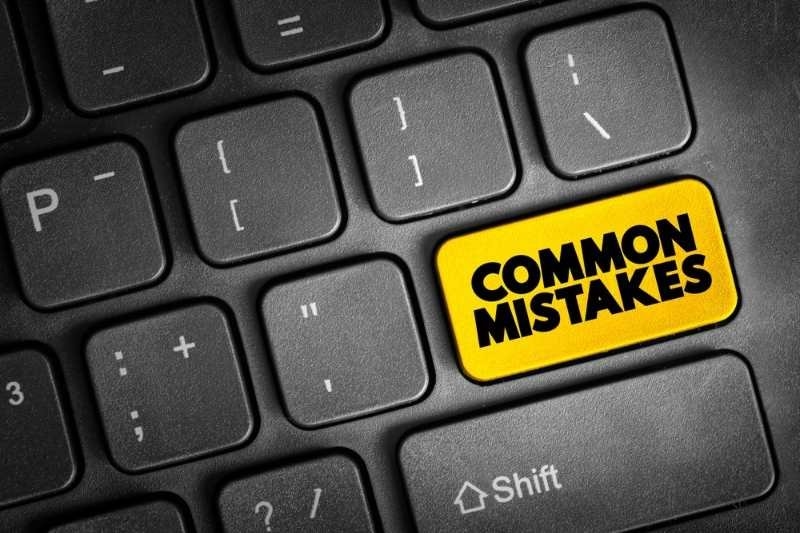 common mistakes written on a keyboard