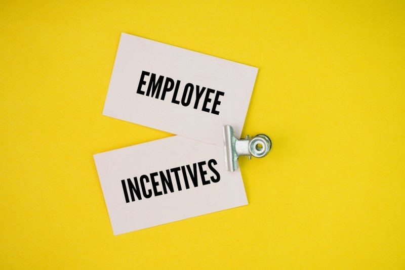 paper with the word employee incentives