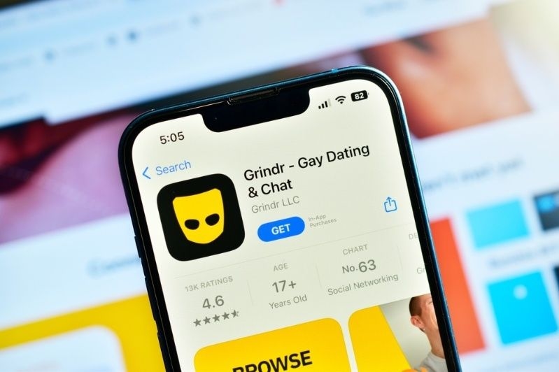 Smartphone displaying the Grindr app page on an app store screen.