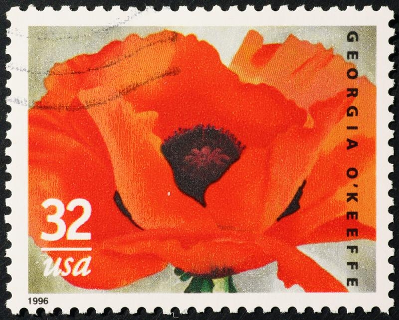 Poppy painted by Georgia O'Keeffe on postage stamp