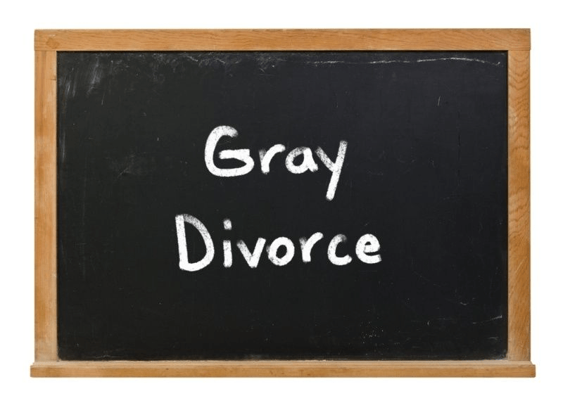 Black chalkboard with the words ‘Gray Divorce’ written in white chalk.