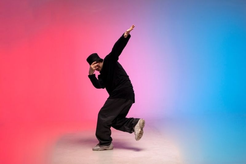 Dancer dances in  hip hop style