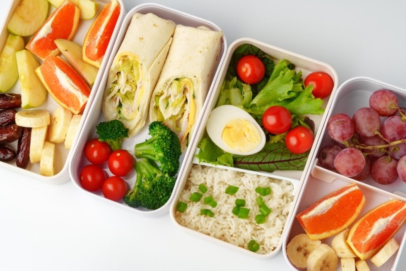 Healthy bento box with fruits and vegetables.