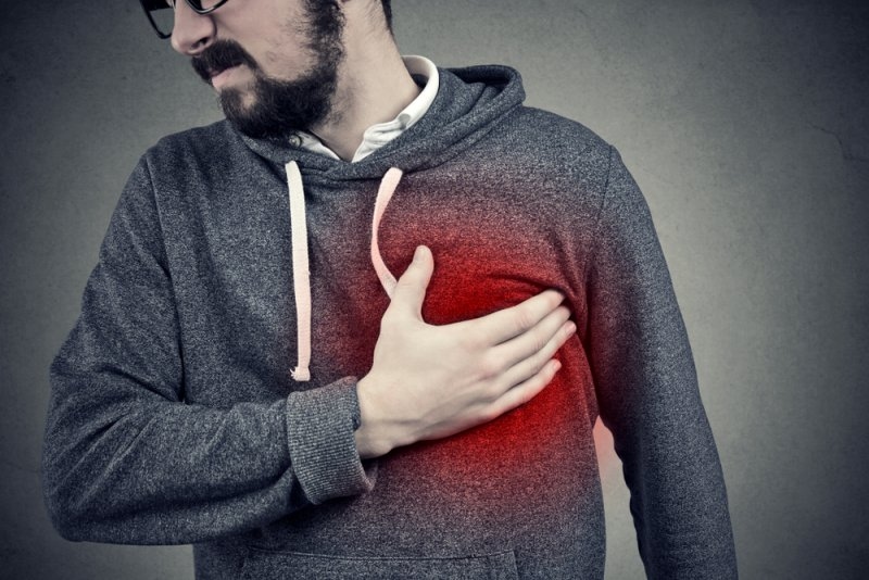 man suffering from pain in chest having problem with coronary anomaly.