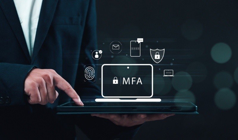 businessman using tablet with secure computer technology graphics icon.