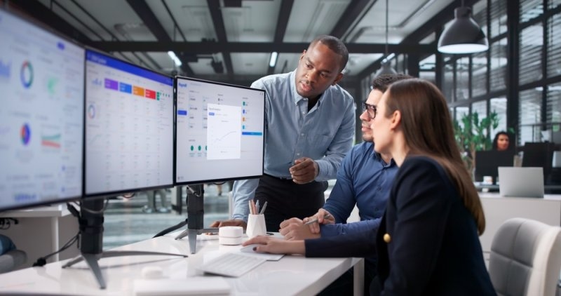 Modern Office Scene With Diverse Payroll Team