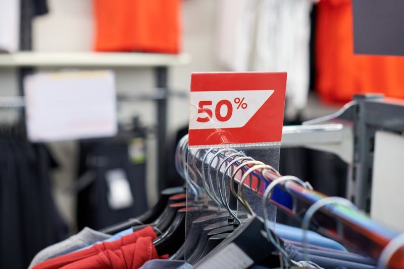 Clothing store sale racks with discounted apparel