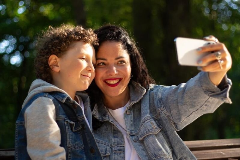 Mother taking a selfie with her son 