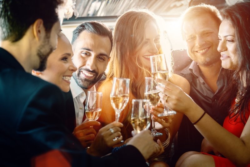 Young people having an engagement party with the couple