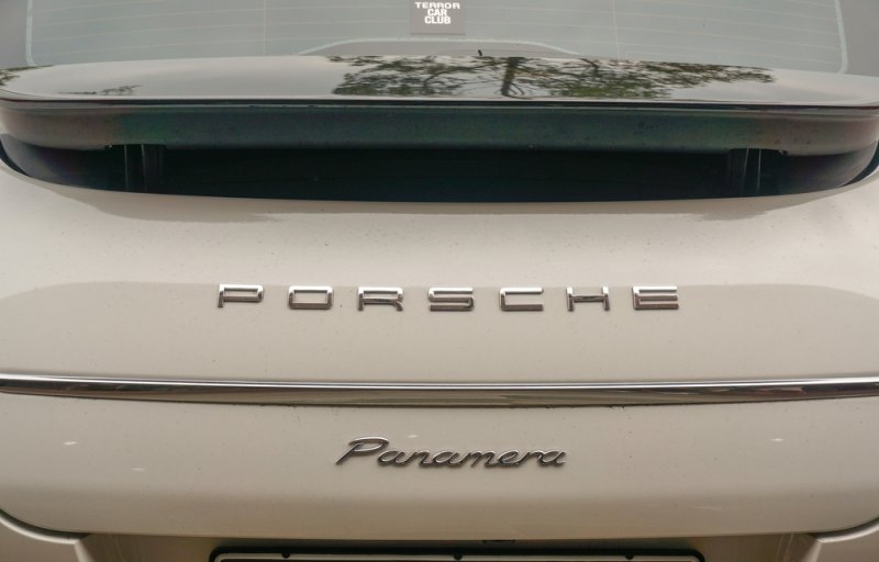 Close-up rear view of a white Porsche Panamera