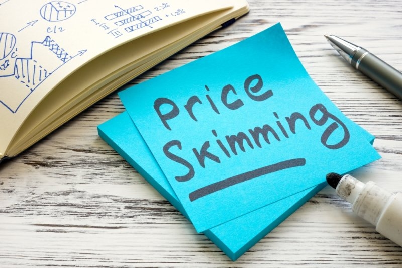 Text Price Skimming written on a stick note