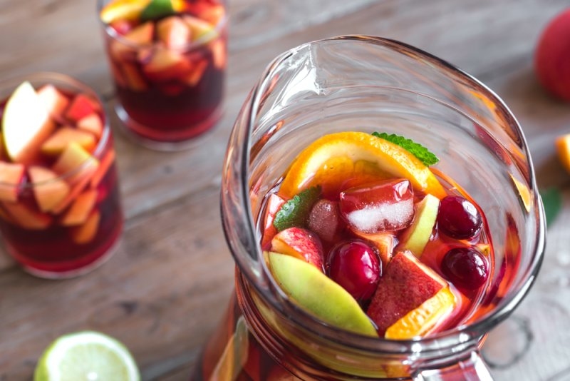 Red wine sangria cocktail with fresh fruit and ice