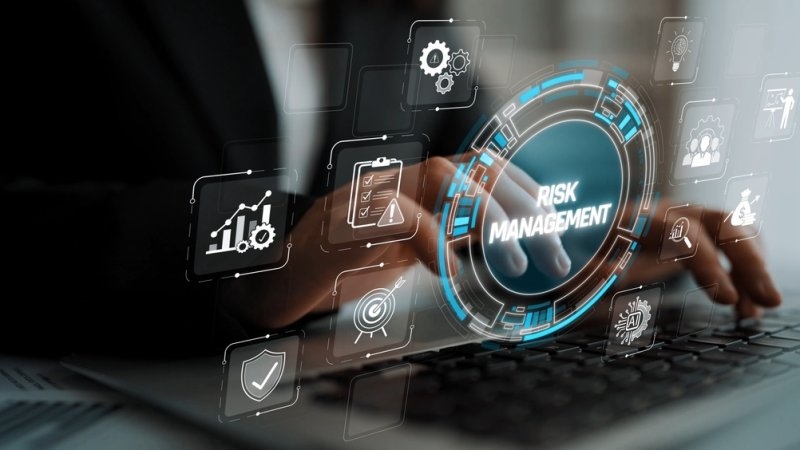 Business professional engaging with digital tools for risk management