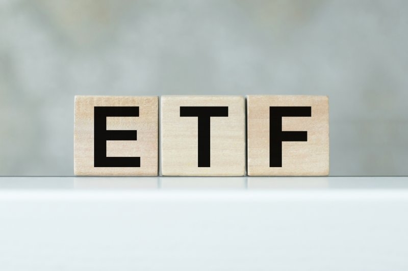 Text ETF printed on wooden blocks