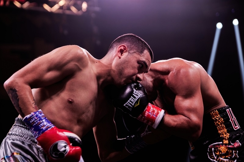 fighters fighting in boxing ring