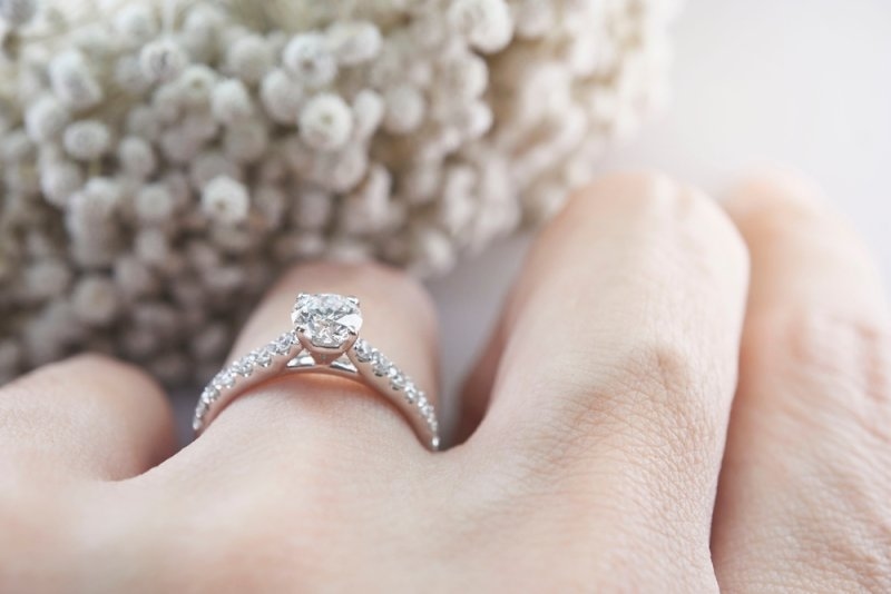 Woman wearing a diamond engagement ring