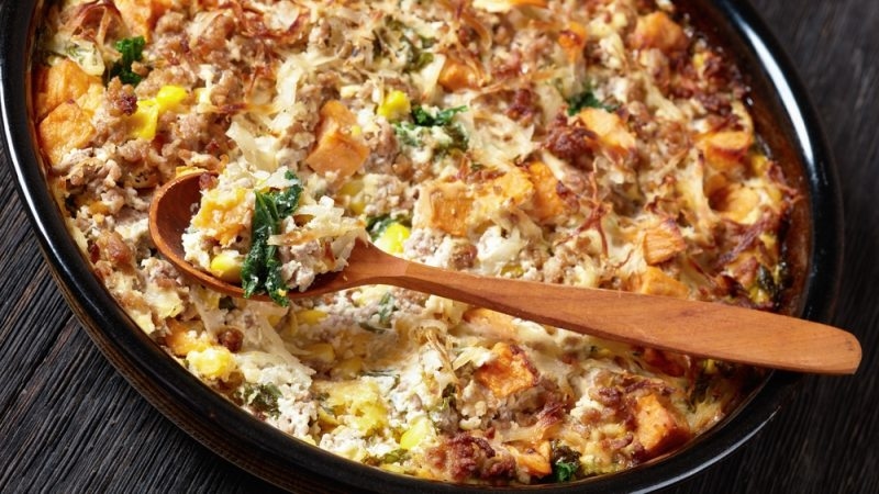 Sausage-Hash Brown Breakfast Casserole with corn, kale, sweet potatoes and cheese