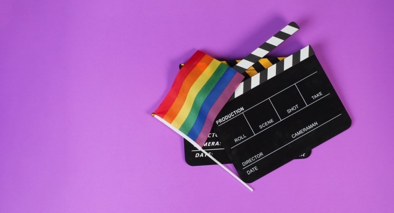Two Clapper board and rainbow pride flag 