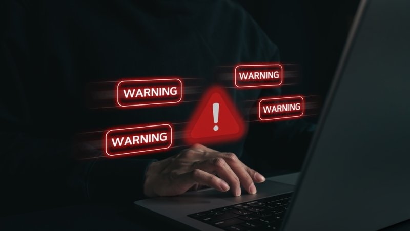 Security Warning Alert on Laptop