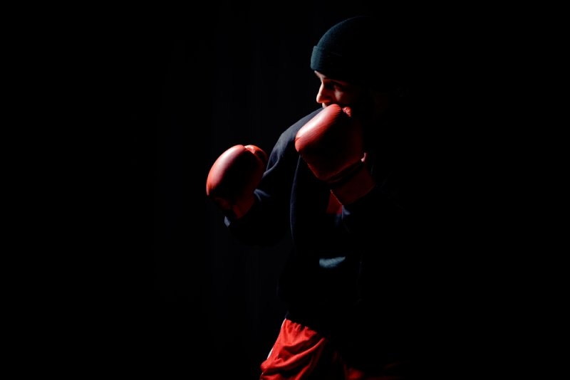 brutal boxer in boxing gloves 
