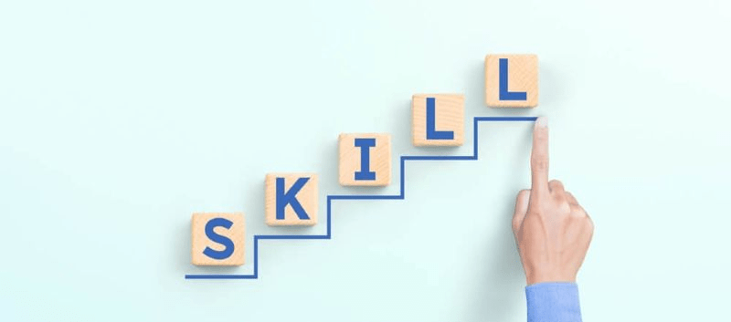 Text skill on wooden blocks kept on upward stairs