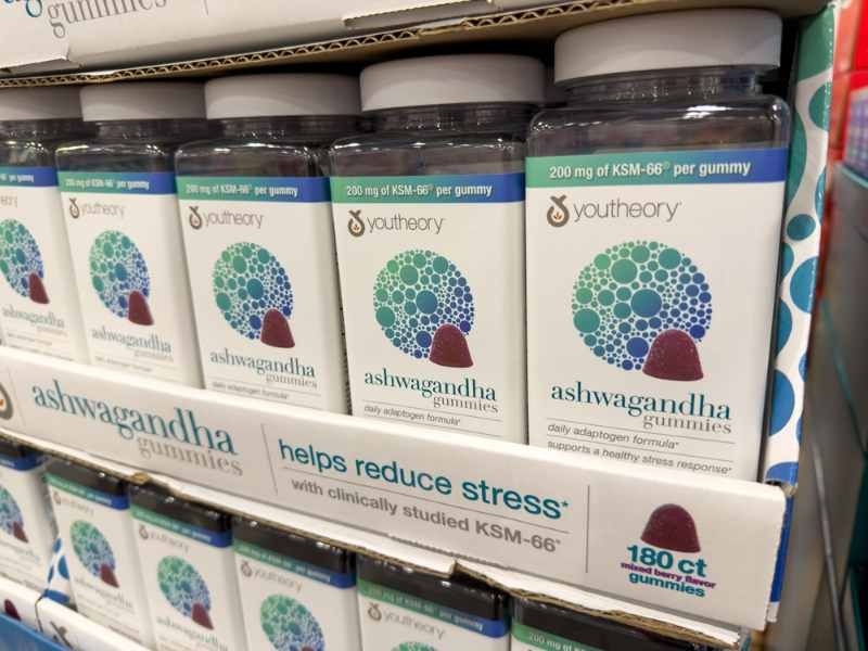 Store shelves stocked with ashwagandha gummies, with packaging highlighting stress reduction and KSM-66.