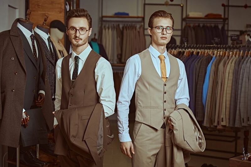 man posing for stitched suits 