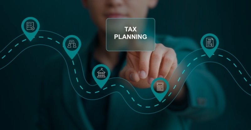  Tax Planning concept with mam clicking the 3d button with word tax planning