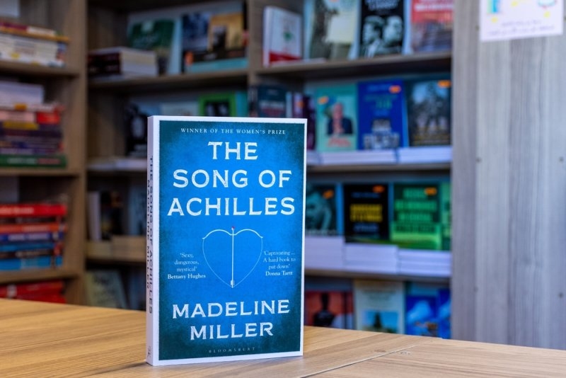 The Song of Achilles book by Madeline Miller kept on table