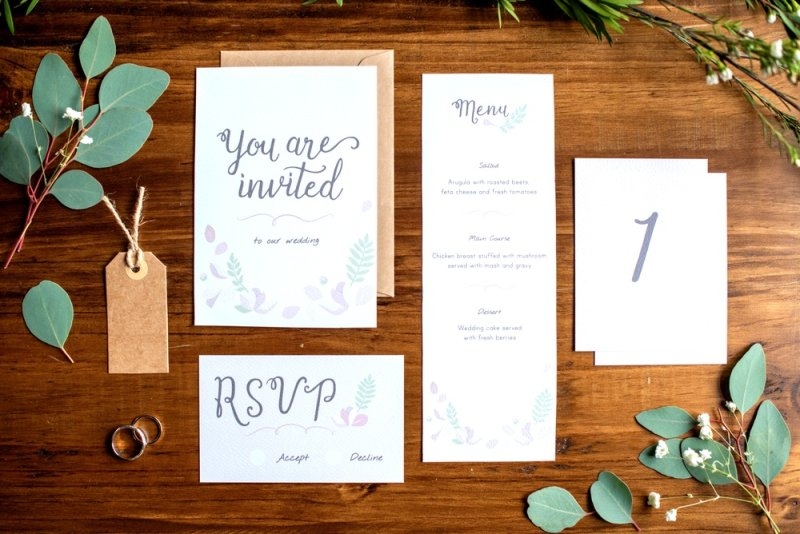 wedding invitation set with floral accents, featuring RSVP
