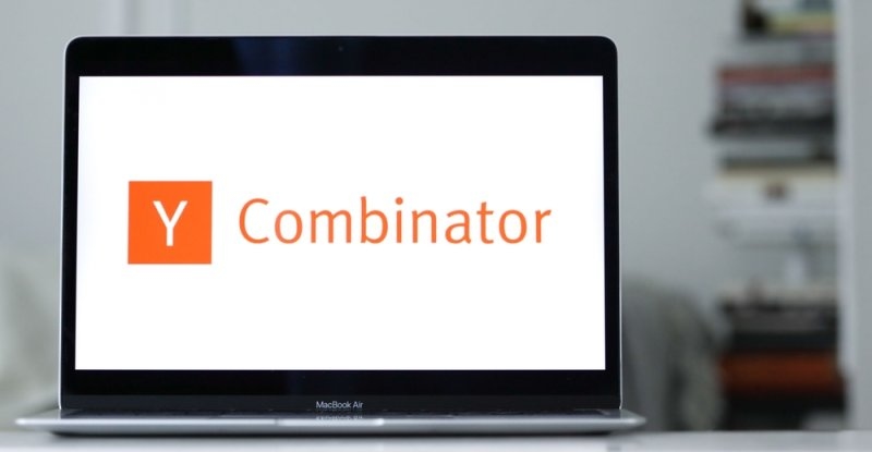 Y Combinator (YC) company logo on a laptop screen