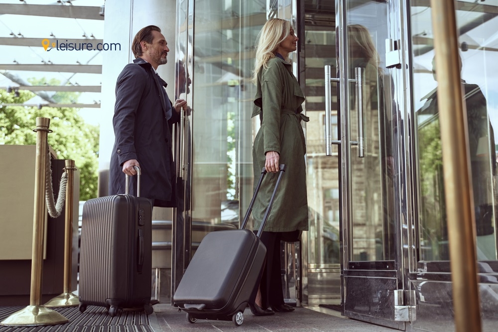 Businessman and Woman with luggage